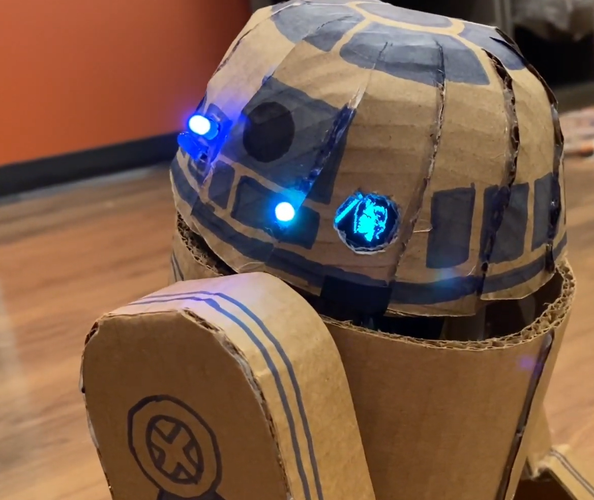 Montserrat's illuminated cardboard R2-D2 robot